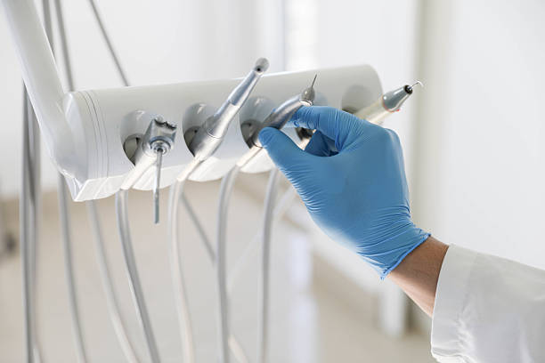 Professional Tooth Extraction technician working in Halstead, KS